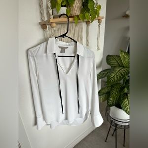 Super cute white blouse with black strings